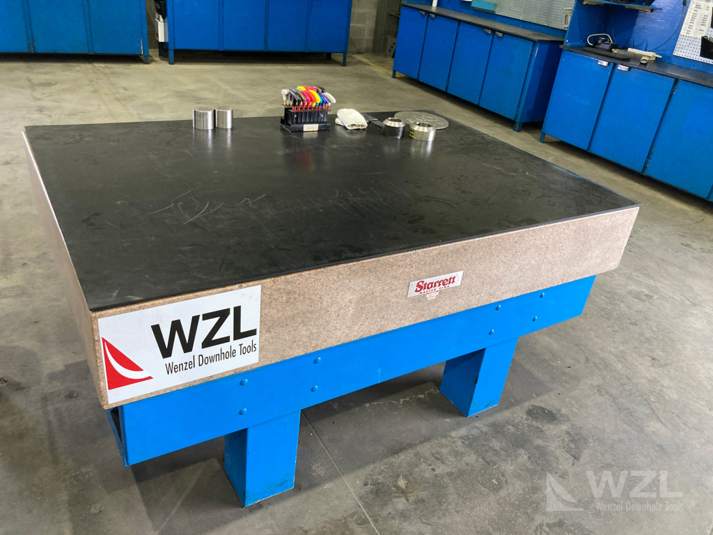 Specialized level table for performing Quality Assurance tasks. The table is made of a large slab of granite that ensures level calibration when measuring parts at a high degree of accuracy.